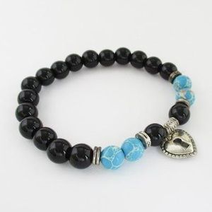 Macy’s Howlite and Onyx stretch bracelet